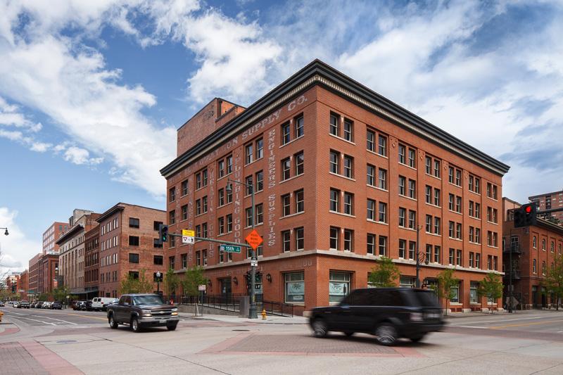 Historic brick facade of the Colorado Saddlery Building in Denver.